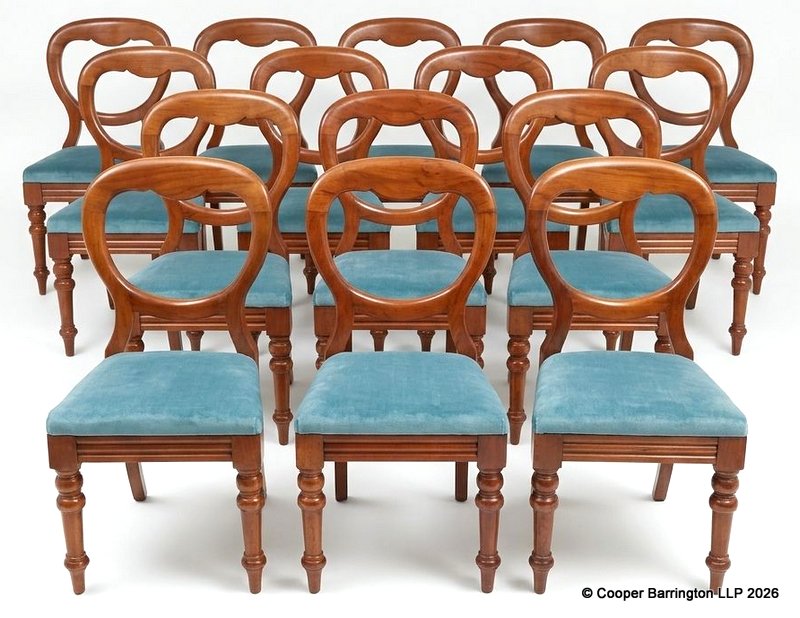 A Scarce Set of 15 Victorian Mahogany Balloon Back Chairs with Blue Velor Upholstered Drop in Seat Cushions.  Late 19th Century. Height 35.5 inches.
