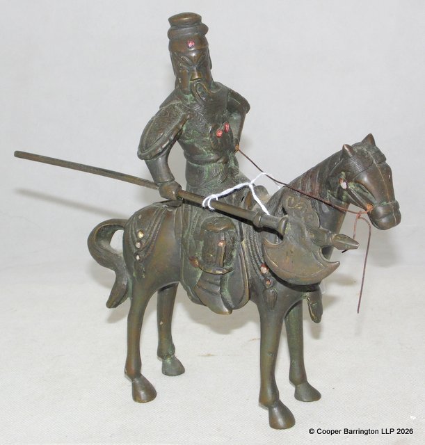 Antique Bronze Sculpture Depicting a Chinese Warrior with Halberd on Horseback. Decorated with semi precious stones.   22 x 23 cm.